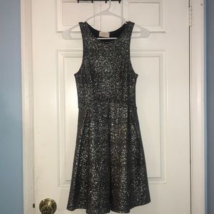 Black and silver pleated dress